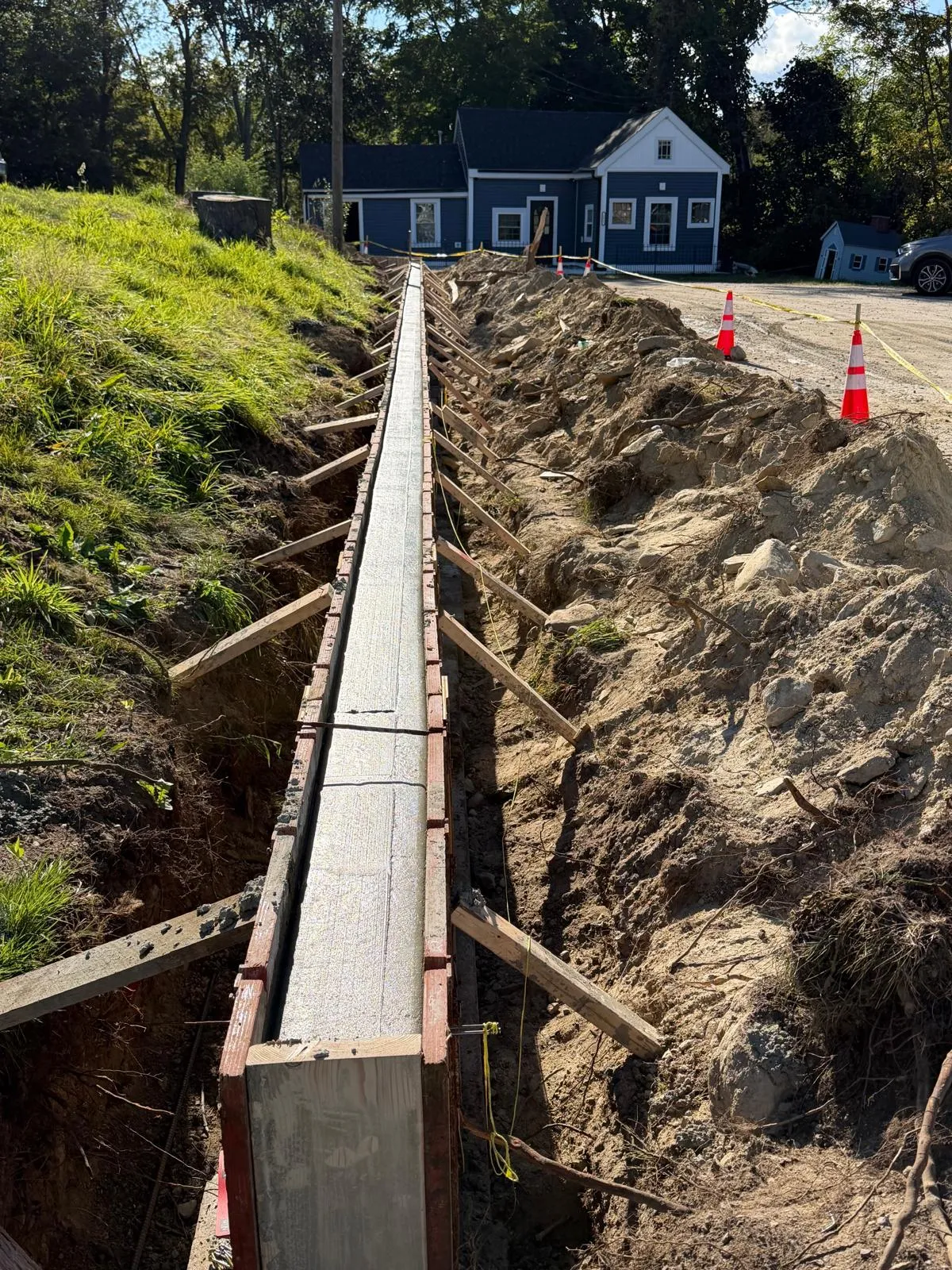 Formwork and shuttering for a concrete wall